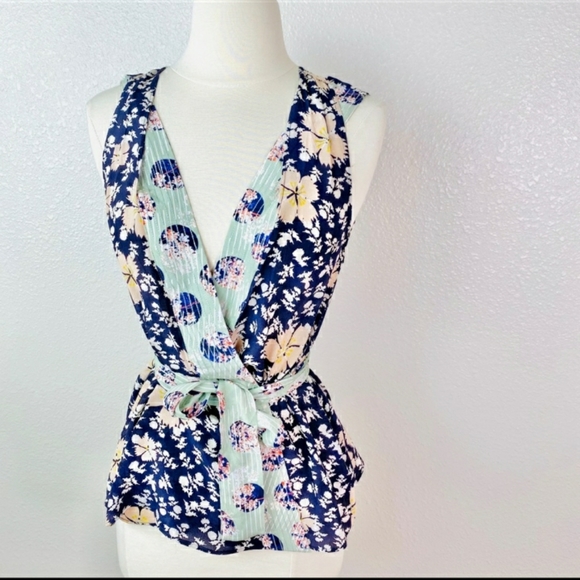Anthropologie Tops - Anthropologie Silk Starflower Wrap Blouse